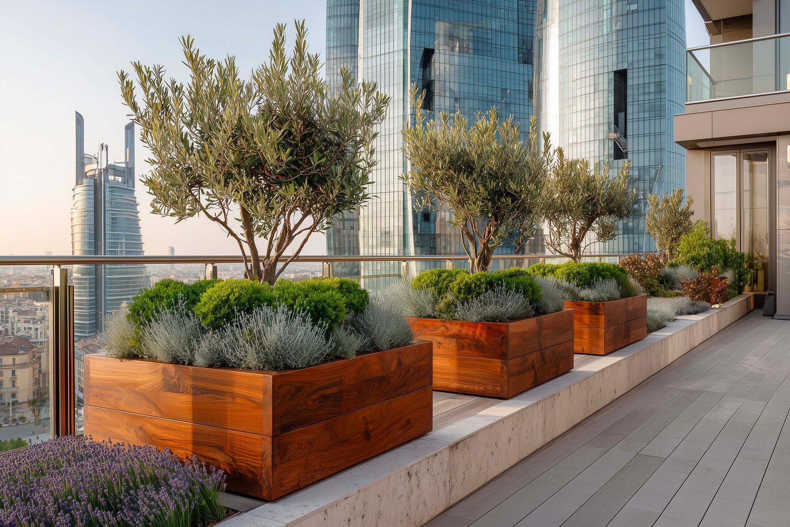Terrazza rooftop a Milano con tre fioriere Lignum in noce affumicato e Olea europaea, Lavandula angustifolia, skyline CityLife — Paracelsus Gardens™