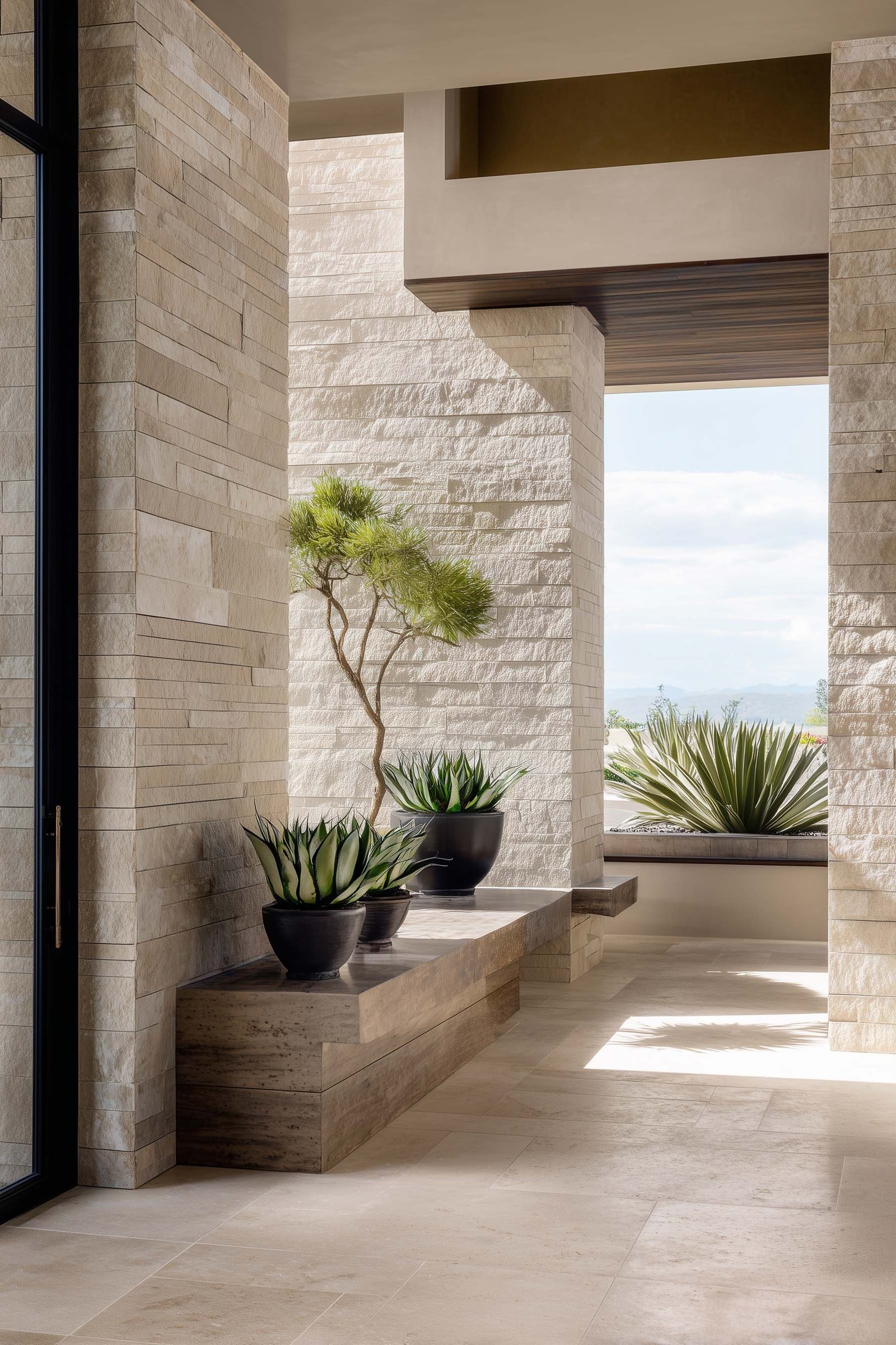 Minimal botanical presence integrated into Californian architecture, shaping space through light, pause and restraint