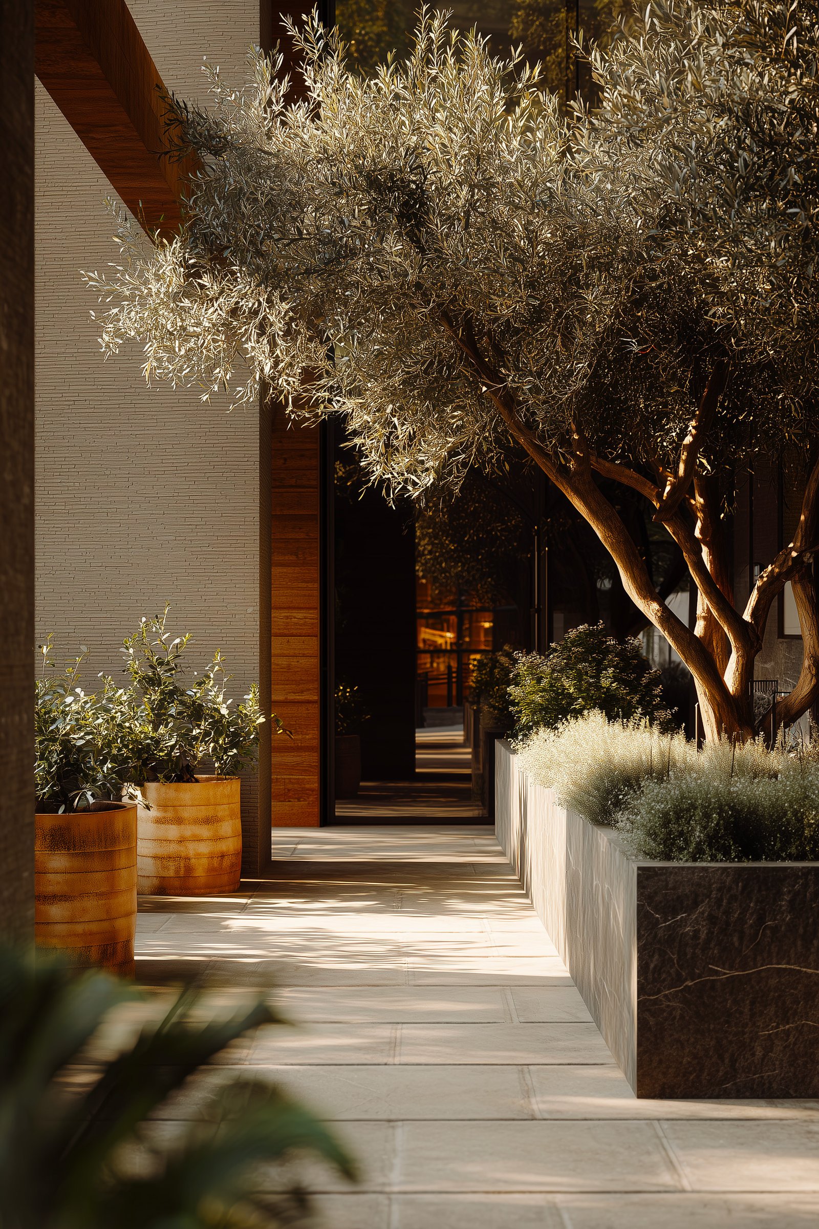 Image éditoriale verticale : un moment architectural contenu, cadré par le végétal